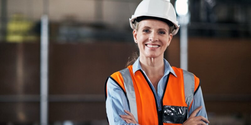 Woman with safety helmet