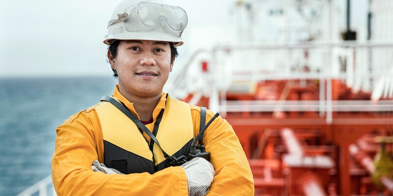 Asian ship crew on oil tanker