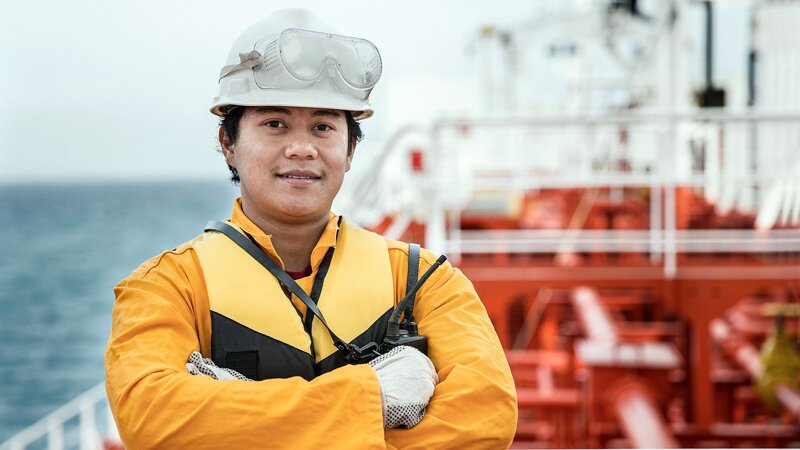 Asian ship crew on oil tanker