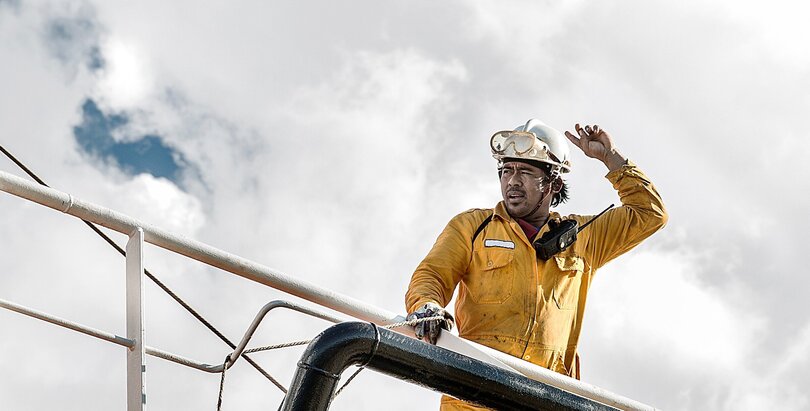 Worker in oil tanker