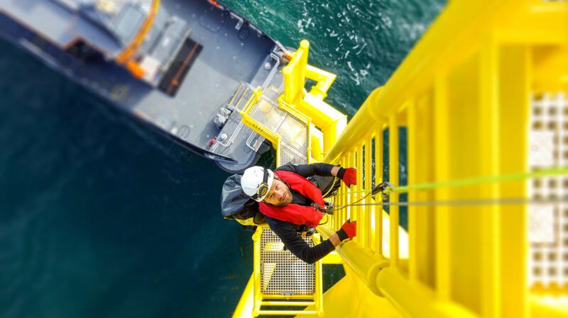 Man on yellow ladder