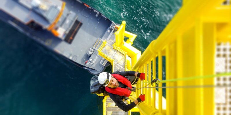 Man on yellow ladder