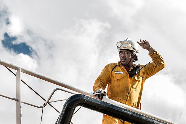 Man on oil tanker